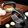 Garlic Grinder Crush Tool ready for use on kitchen countertop.