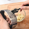 Removable basket of Stainless Steel Garlic Crusher for easy cleaning.